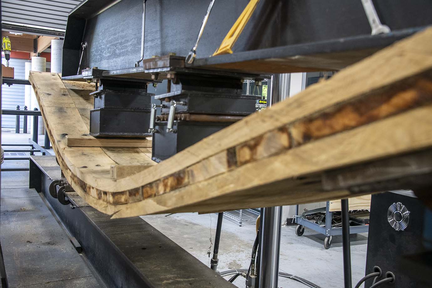 Photo of wood being tested for tensile strength